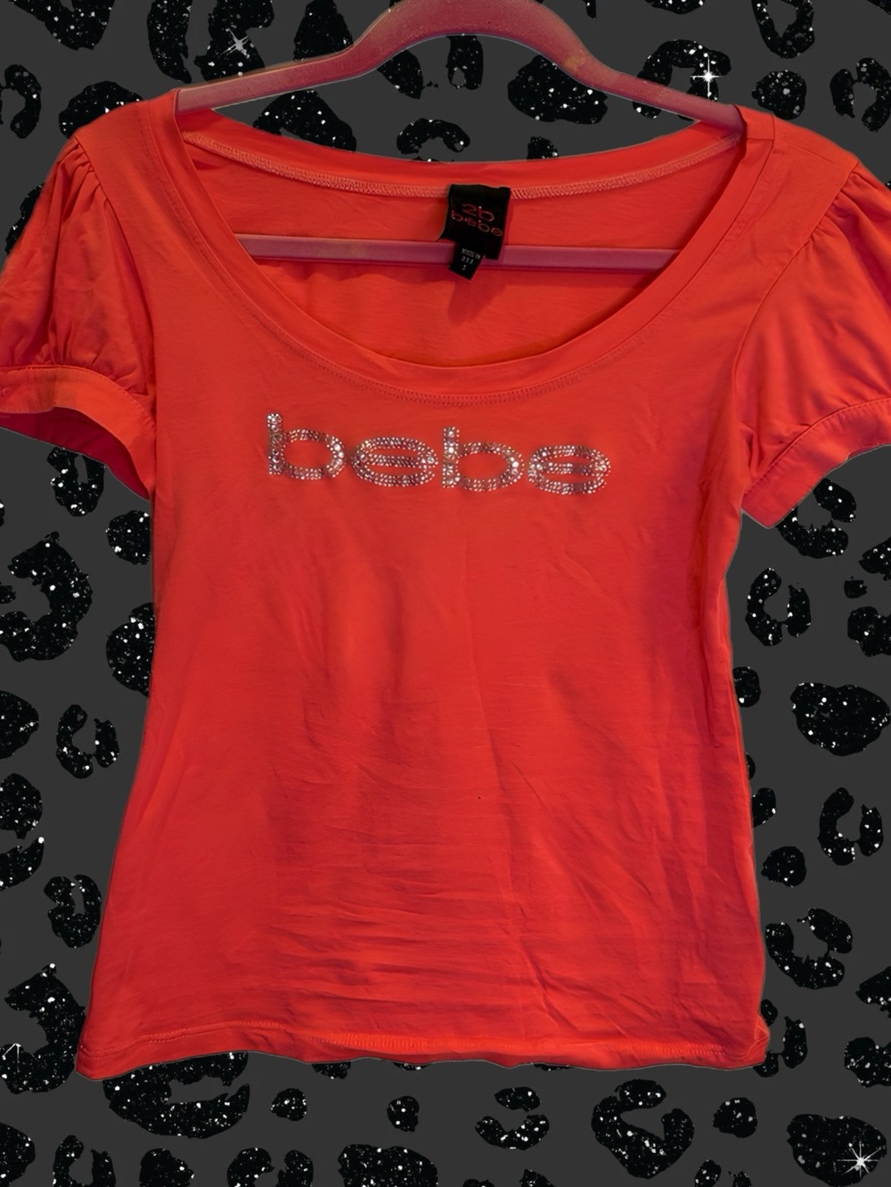 BEBE Coral Scoop Neck Crystal Logo Tee, Women’s size Small, Like New